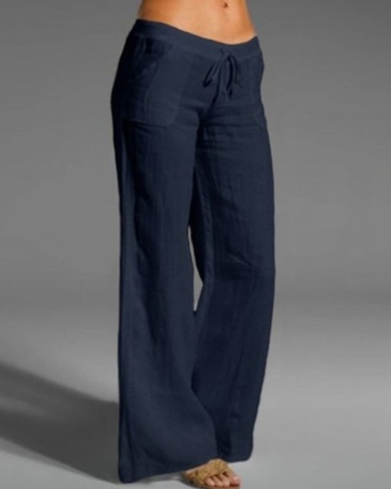 Ensfarvede bukser med vide ben