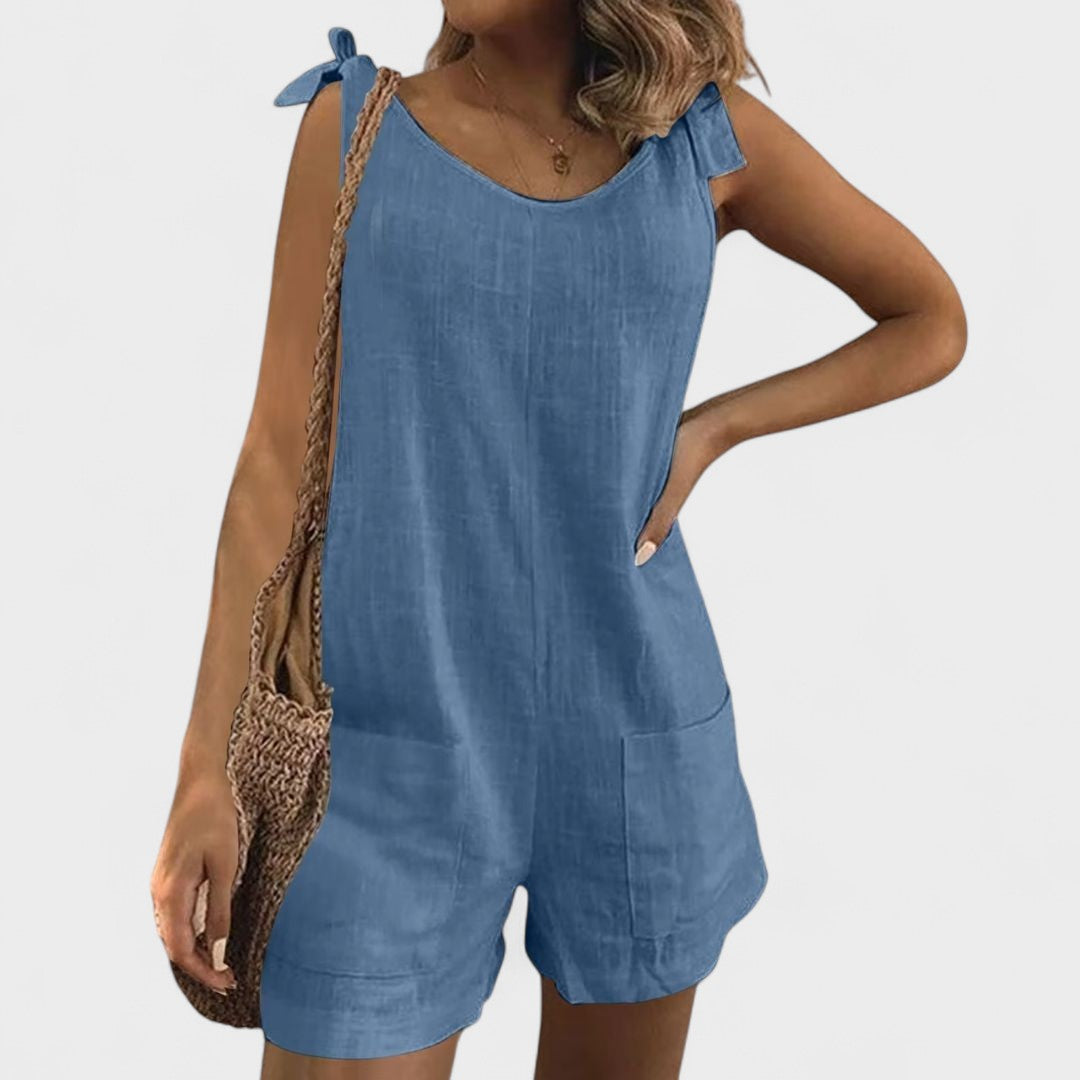 Yolanda - Jumpsuit med lommer på skuldrene og en elegant sløjfe