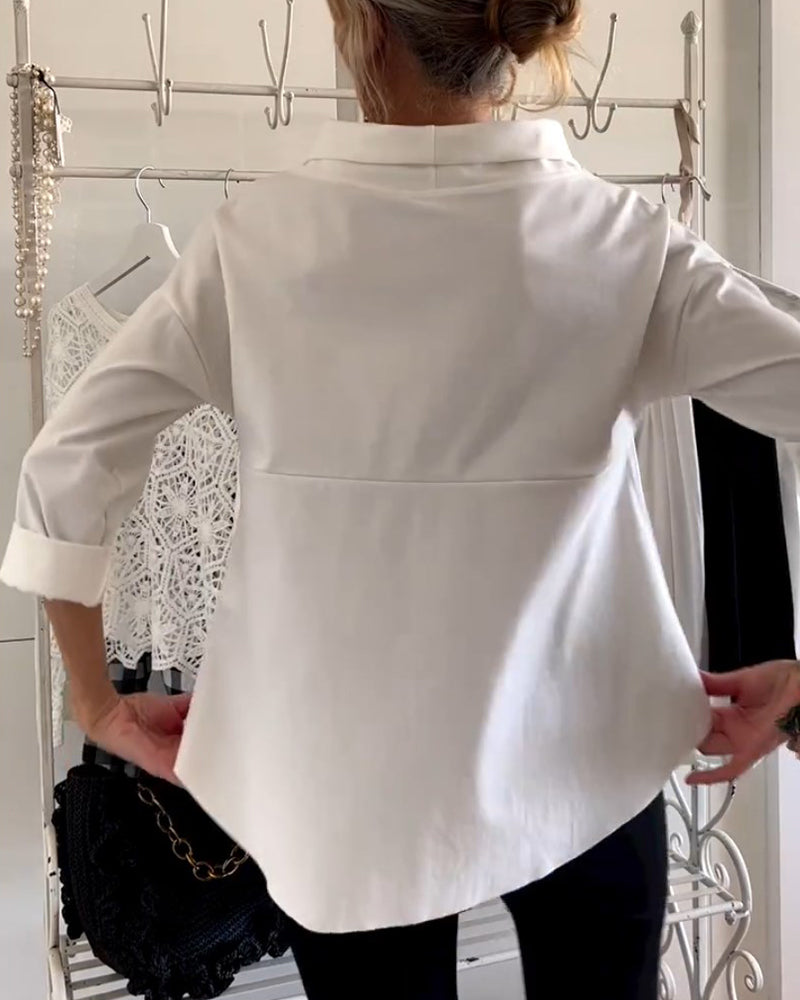 Eva | Afslappet top med ensfarvet revers