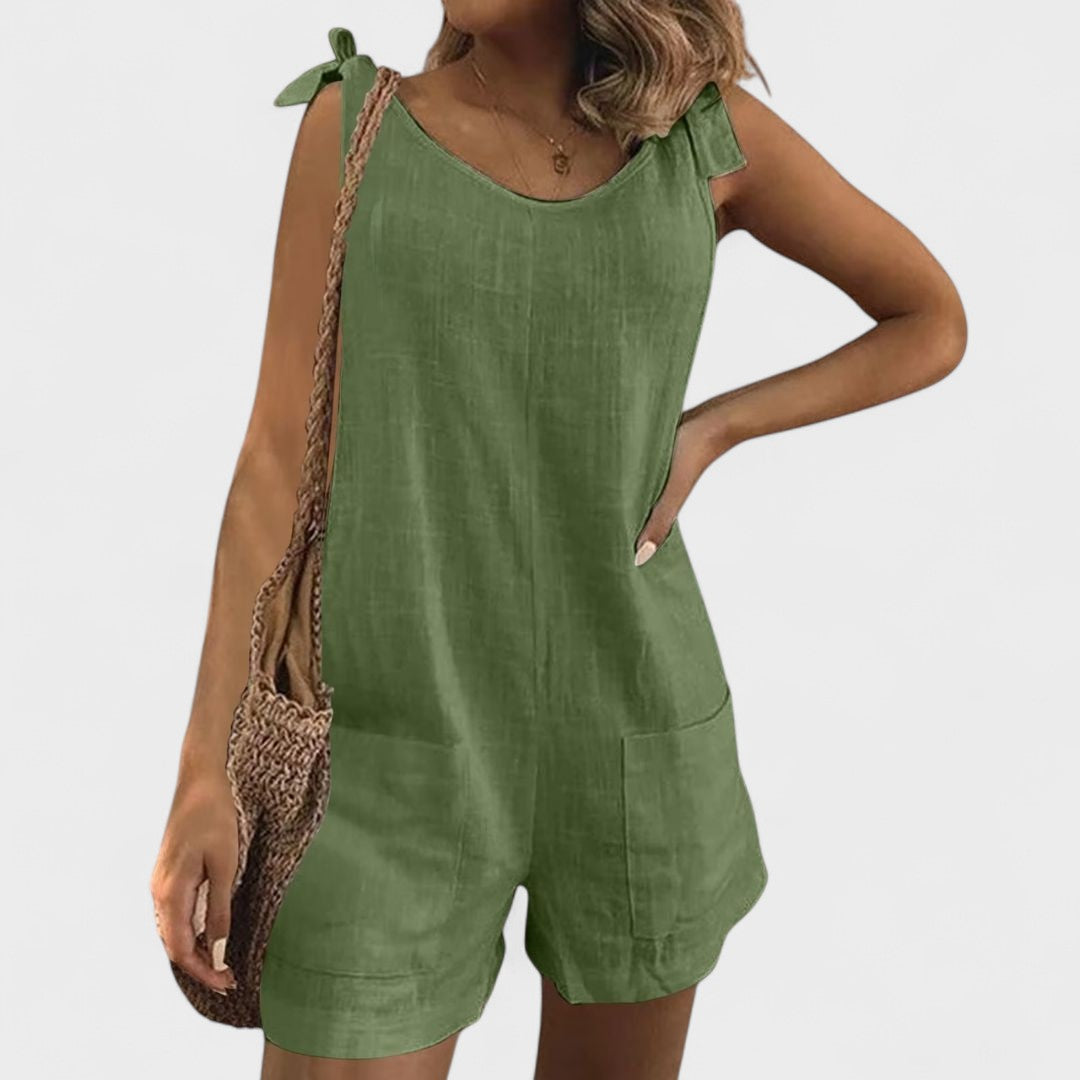 Yolanda - Jumpsuit med lommer på skuldrene og en elegant sløjfe