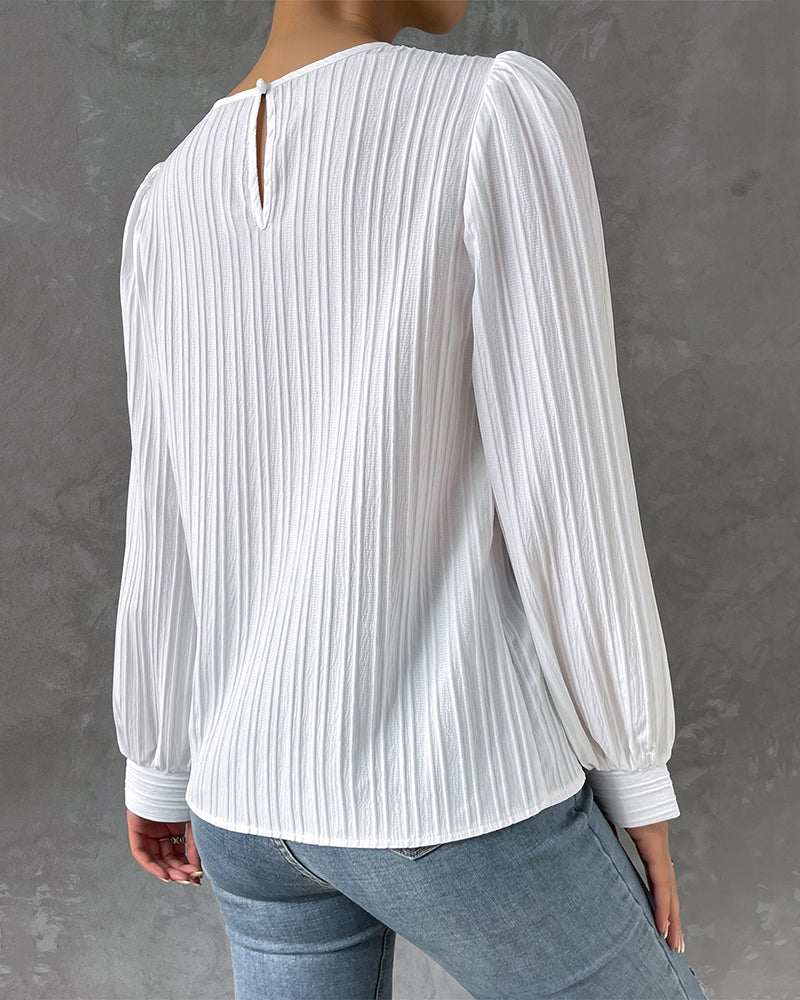 Roos | Ensfarvet bluse med lygteærmer