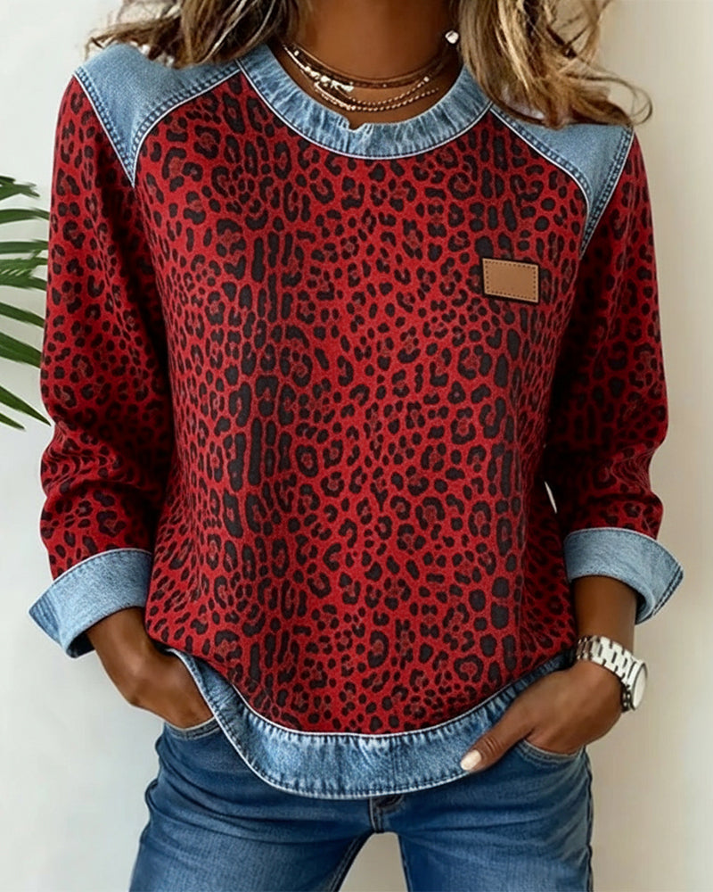 Ilse | Leopardprintet sweater med denim-patchwork