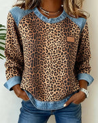 Ilse | Leopardprintet sweater med denim-patchwork