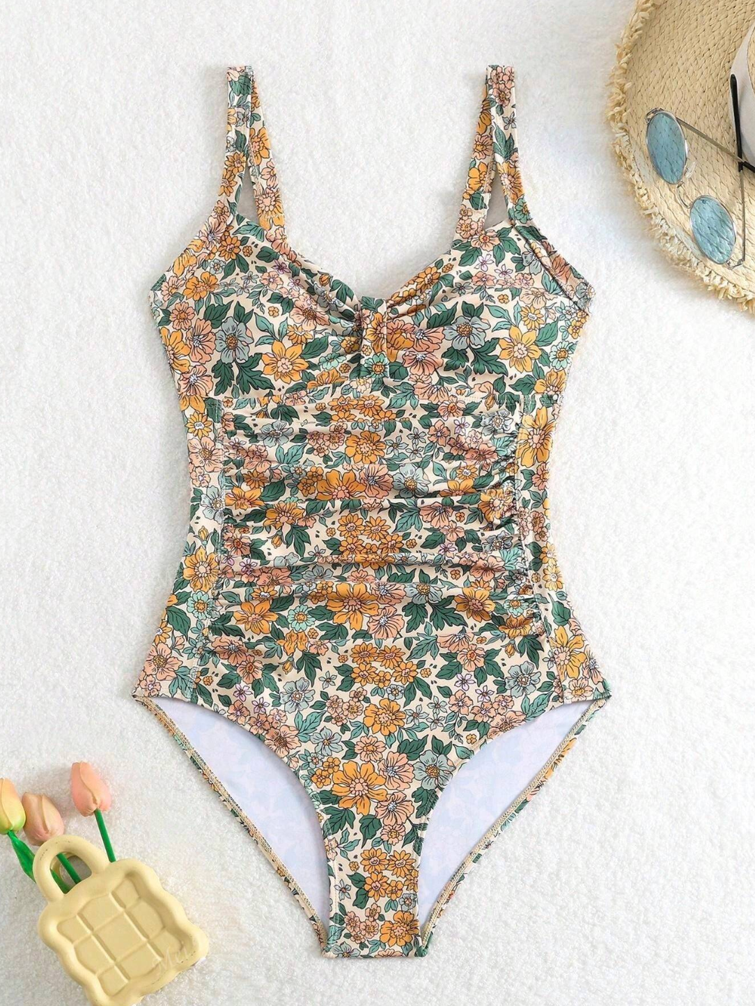 Luísa - badedragt med halterneck og blomsterprint