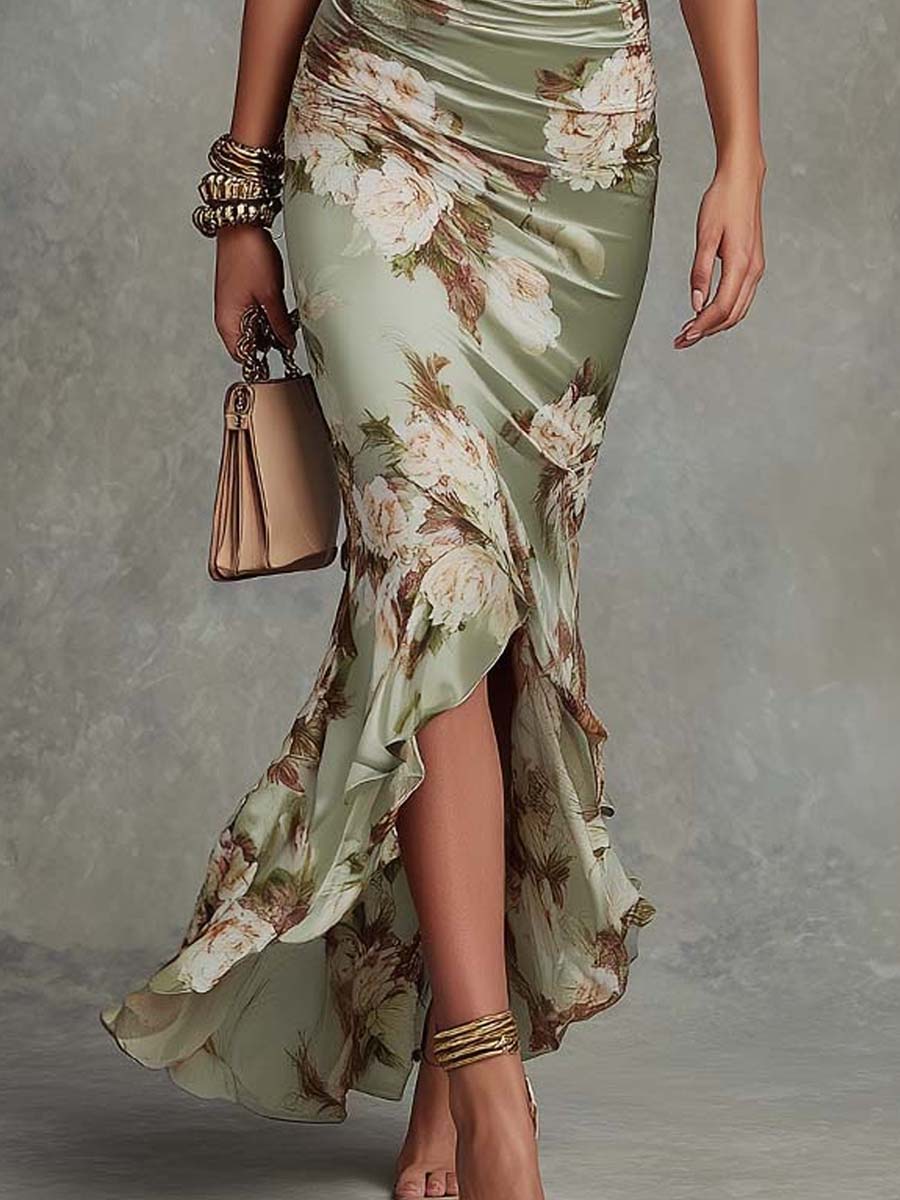 Loes | Grøn asymmetrisk satin kjole med blomsterprint