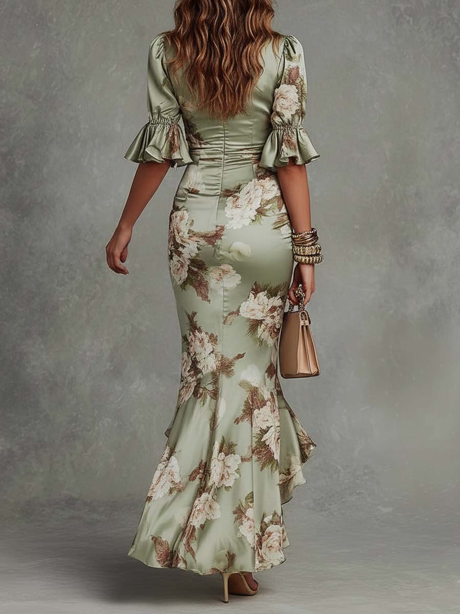 Loes | Grøn asymmetrisk satin kjole med blomsterprint
