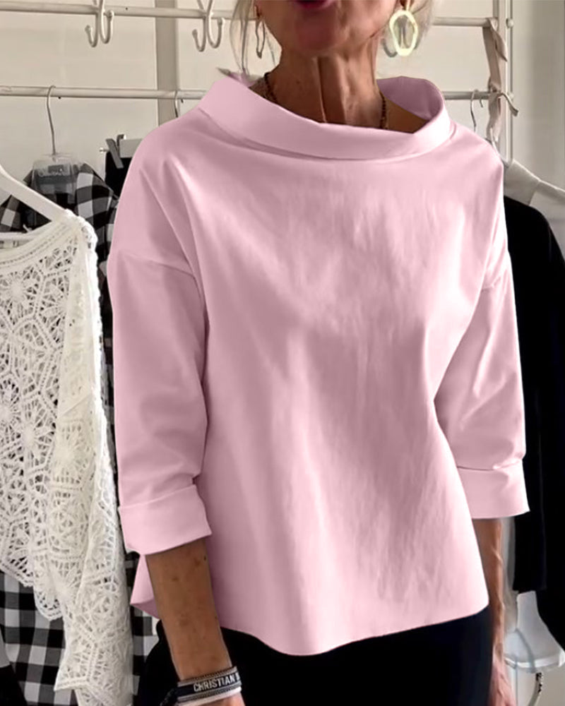 Eva | Afslappet top med ensfarvet revers