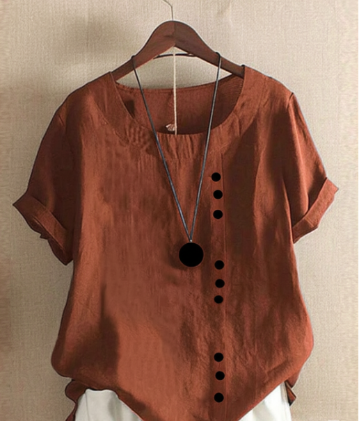 Damebluse i hør med pynteknapper