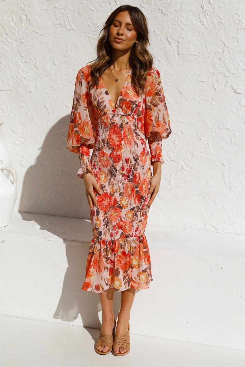 Kiana™ - Orange langærmet kjole med elegant print og V-udskæring