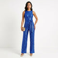 Madalena - Skinnende jumpsuit til fester: Glamour og uforglemmelig glans