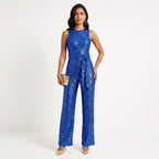 Madalena - Skinnende jumpsuit til fester: Glamour og uforglemmelig glans