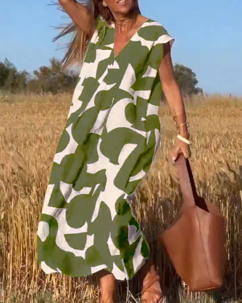 Stéphanie - V-udskåret kjole med print