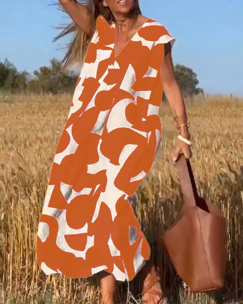Stéphanie - V-udskåret kjole med print