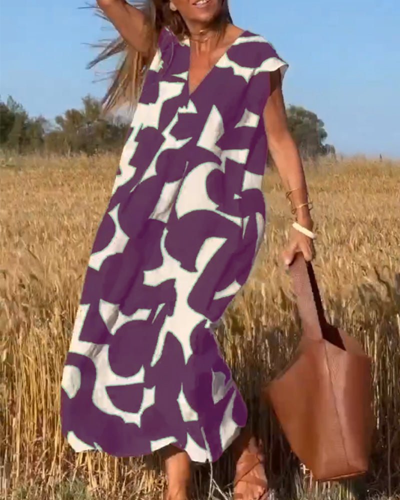 Stéphanie - V-udskåret kjole med print