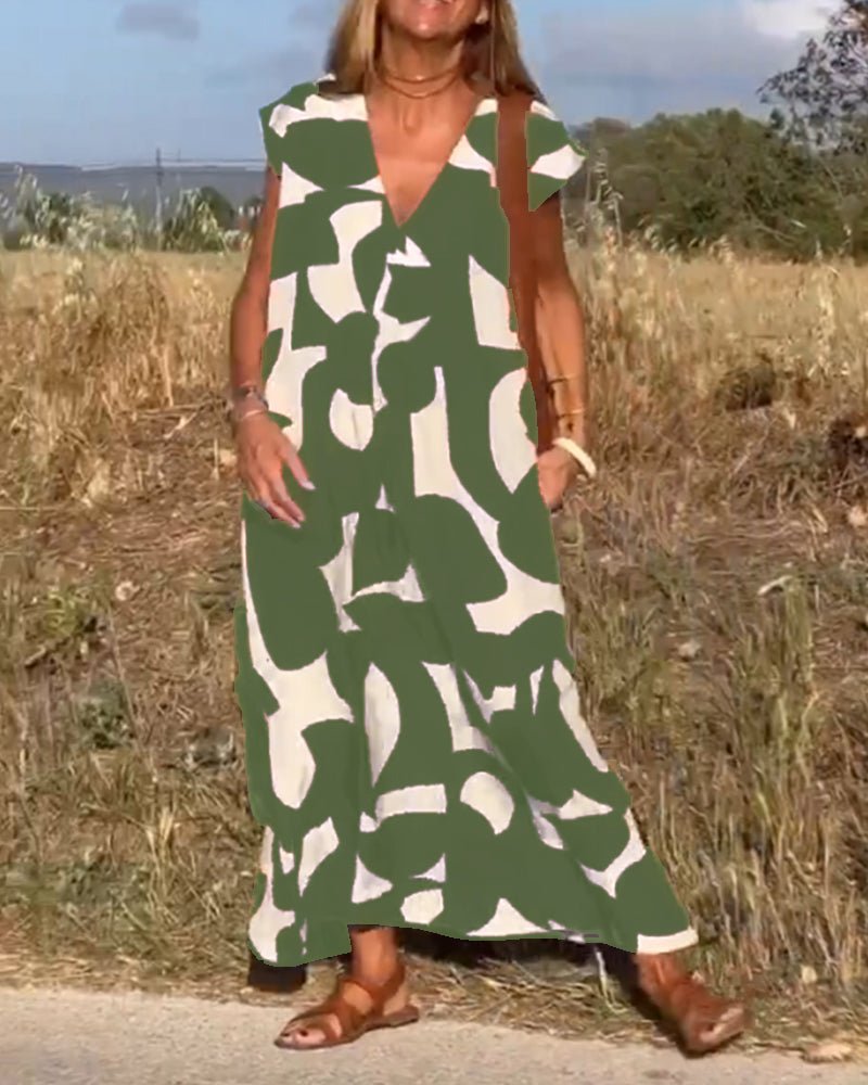 Stéphanie - V-udskåret kjole med print