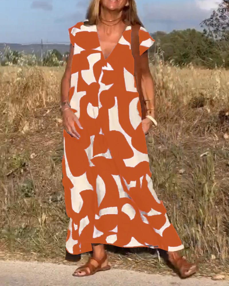 Stéphanie - V-udskåret kjole med print