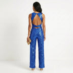 Madalena - Skinnende jumpsuit til fester: Glamour og uforglemmelig glans