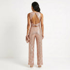 Madalena - Skinnende jumpsuit til fester: Glamour og uforglemmelig glans