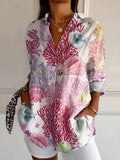 Bluse med flydende print