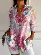 Bluse med flydende print